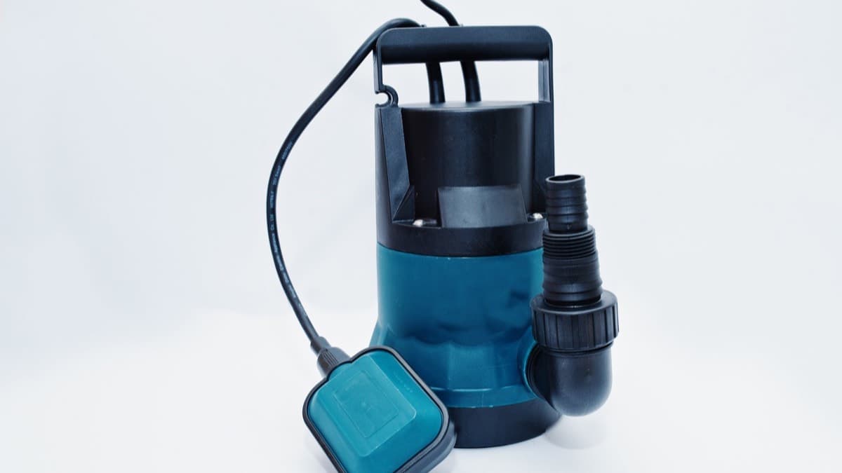A submersible pump with its float switch on a white background